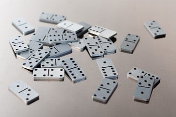 Steel dominoes on a polished surface