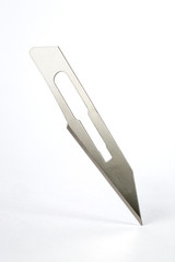 Stainless steel scalpel used for surgery - white background