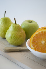 orange, apple and pear fresh fruit isolated on white