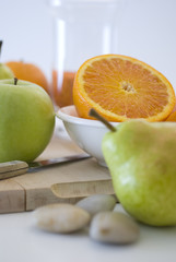 orange, apple and pear fresh fruit isolated on white