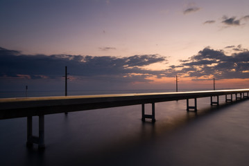Fototapeta na wymiar Seven mile bridge at sunset - Florida keys