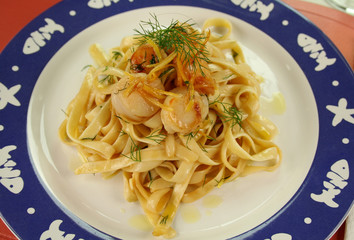 Fettucini with caramelized lemon and dill sea scallops.