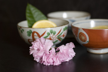 Asian herb tea on an old rustic cup
