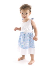 Little Baby Girl walking on white .