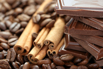 arrangement of chocolate coffee and cinnamon sticks