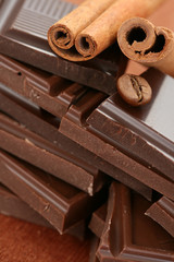 arrangement of chocolate coffee and cinnamon sticks