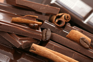 arrangement of chocolate coffee and cinnamon sticks