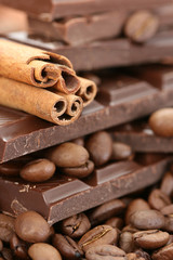 arrangement of chocolate coffee and cinnamon sticks