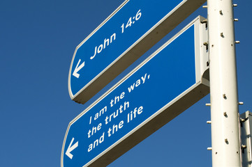 A roadsign giving directions to follow Jesus.
