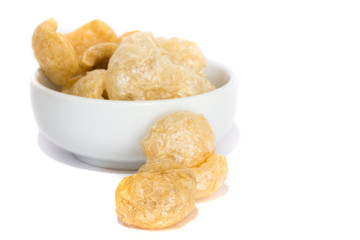 fried pork rinds on a bowl on white background