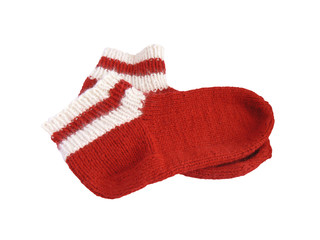 Red woolly socks on white background