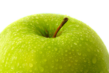 big green apple covered  drop of water on  white background