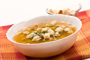 Macro picture of appetizing pea soup with crouton