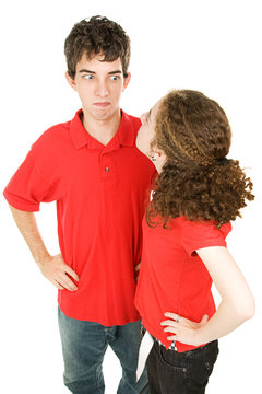 Angry Teen Couple Having An Argument.  Isolated On White.