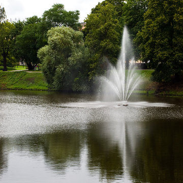 Centrum of Riga, Latvia. Park with gardens and fountains.