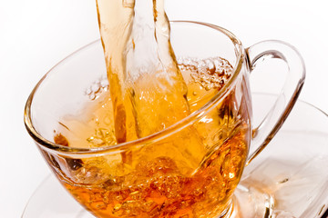 drink series: pouring tea into glassy tea cup