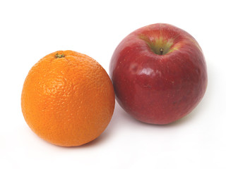 Red Apple and Orange on the white