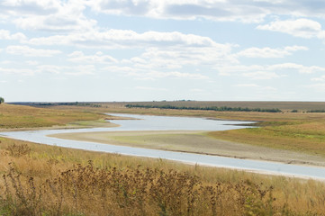 zigzag of the steppe river over the horizon