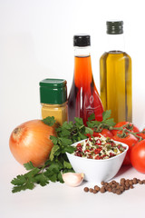Oil, vinegar, herbs, vegetables and spice