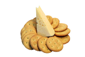 Lot of crackers with piece of cheese
