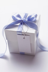 small present with gift tag. copy space for greetings