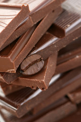 close-ups of dark chocolate and coffee beans