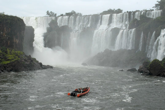 Boat with people in Iguazu waterfalls - Argentina.