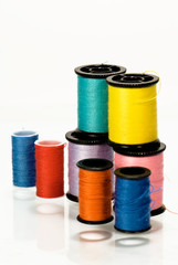 colorful threads isolated over white background