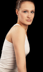 Fototapeta premium young beauty girl isolated on the black