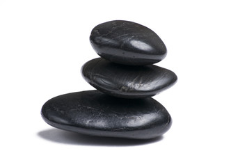 Three stacked stones isloated on white background