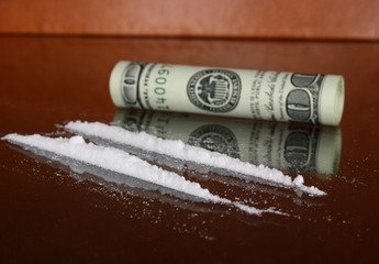 cocaine and one hundred dollars