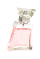 Bottle of pink perfume. Isolation on white