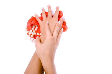 Beautiful woman`s hands with pearls