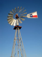 A windmill against the blue Texas sky. - 9625372