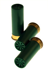 Fototapeta premium Isolated on white unused green shotgun shells