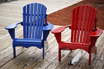 Fototapeta na wymiar Blue and red chairs