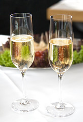 Pair of champagne glaces on the table