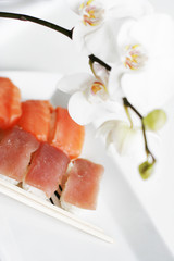 Sushi plate with orchid around