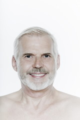Obraz premium expressive portrait of a handsome senior man