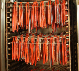 Smoked red salmon in the smoking chamber