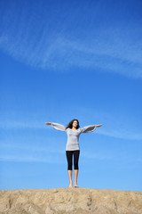 Girl against the backdrop of the sky
