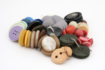 Collection of colorful buttons on white background