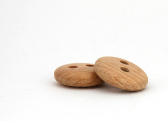 Two wooden buttons