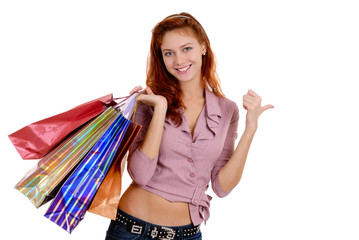 Shopping sexy woman isolated on white background