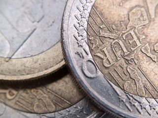 Euro coins of different value macro above