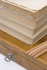 Vintage background with old books and wood box