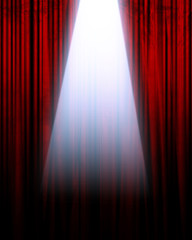 red movie or theater curtain with a spotlight
