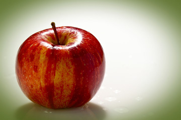 red apple fruit background on white plane