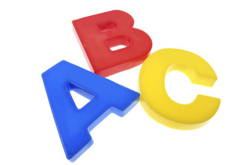 Plastic Alphabets on Isolated White Background