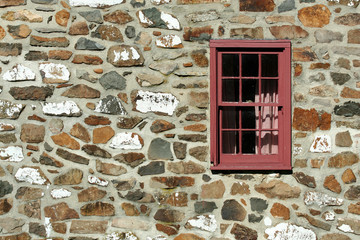 A Old stone house with window